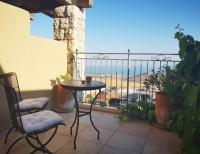 פינת ישיבה במרפסת - קאמי מלון בוטיק וספא גלילי