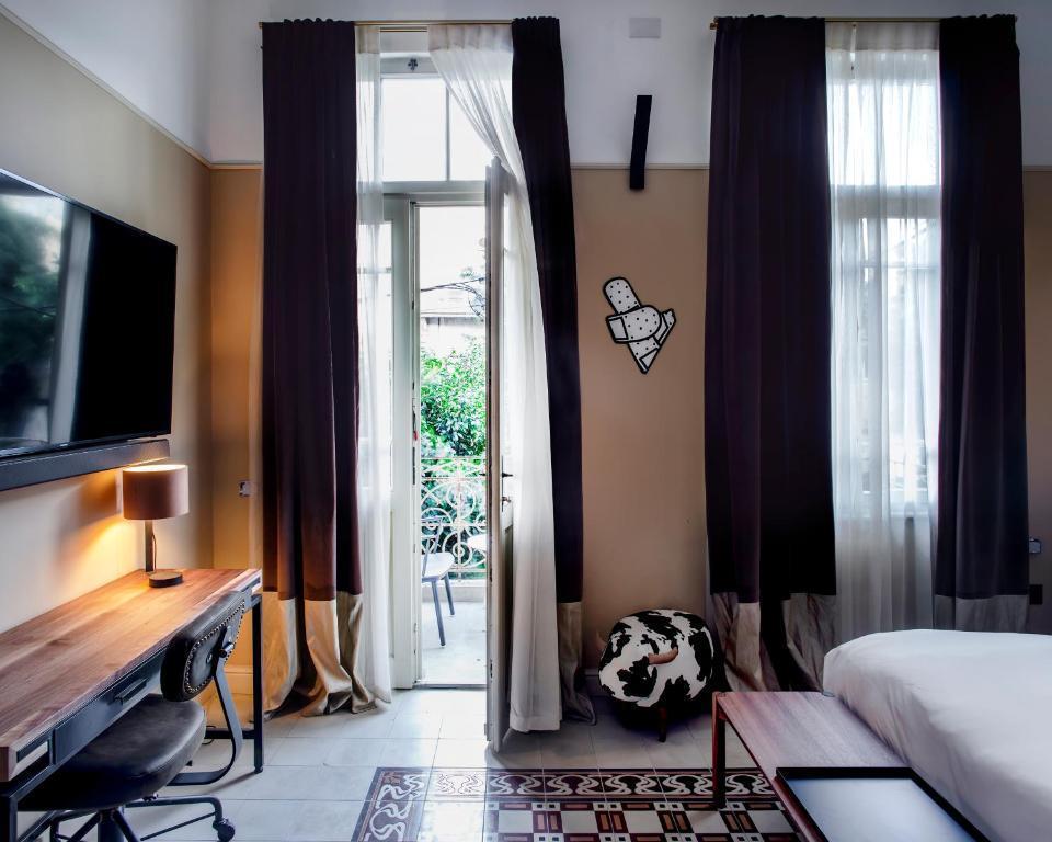 חדר לינה במלון - ספא במלון הבוטיק אסמבלאז תל אביב