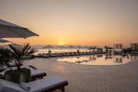  בריכה חיצונית בשקיעה - ספא במלון גלי כנרת