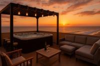  ג'קוזי חיצונית בשקיעה - ספא גורדונוס