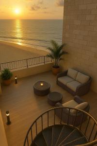  מרפסת מול הים - ספא גורדונס